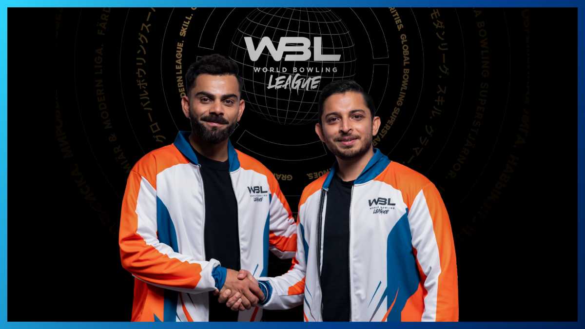 Virat Kohli and co-founder of World Bowling League shaking hands in official WBL jackets during partnership announcement
