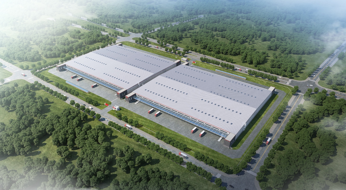 Aerial view of a modern logistics warehouse facility surrounded by greenery, representing large-scale supply chain infrastructure and industrial real estate development in Asia.