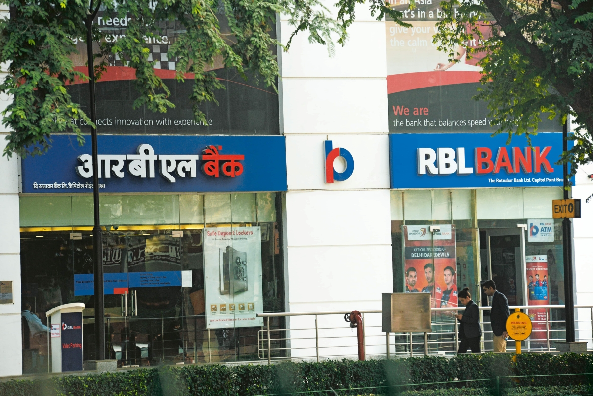 Exterior view of an RBL Bank branch in India with signage in English and Hindi, symbolizing the bank’s retail presence and bilingual accessibility.