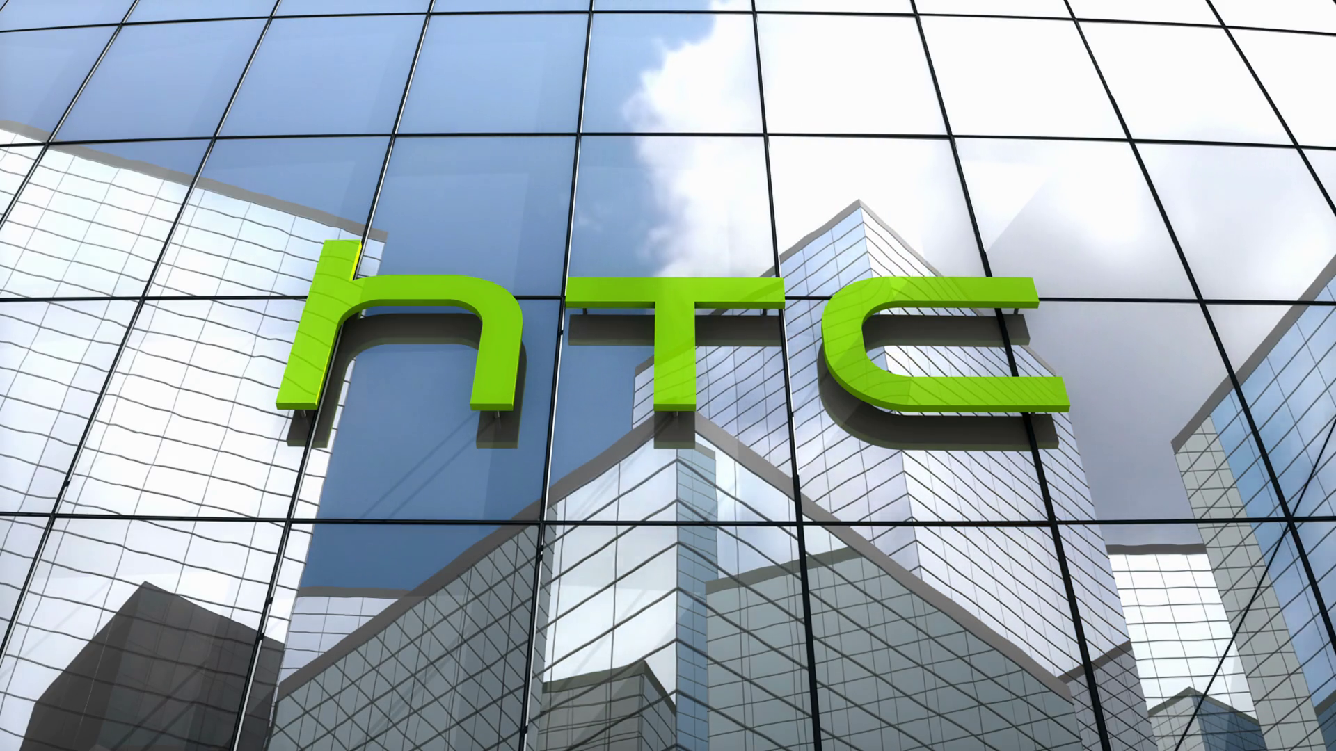 HTC logo mounted on a glass office building façade, with modern skyscrapers reflected in the windows, symbolising the company’s presence in the global technology and electronics industry.