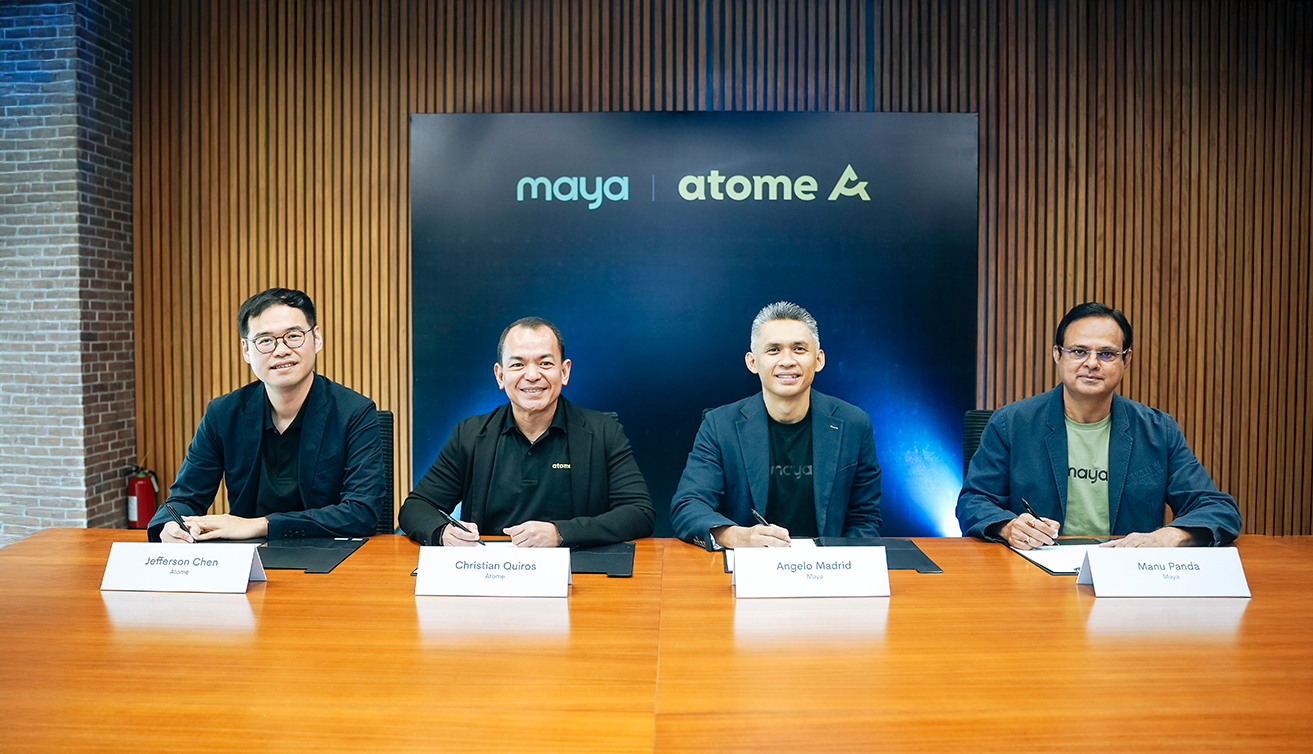 Executives from Maya and Atome pose after signing a strategic partnership agreement, marking a collaboration between the digital payments and buy-now-pay-later platforms to expand fintech services in Southeast Asia.